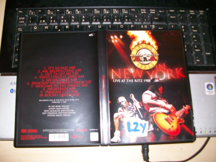 Guns_N_Roses_Guns... - 00_guns_n_roses-in_new_york_1988-dvd-2008-lzy_front.JPG.decrypted